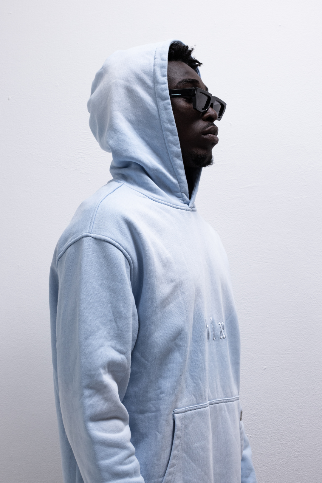Faded light blue Hoodie (light blue embroidery)